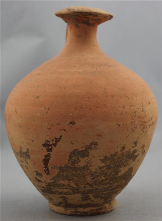 A Roman terracotta flagon, c.2nd century AD, 19cm